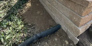 Retaining wall drainage install in Moline