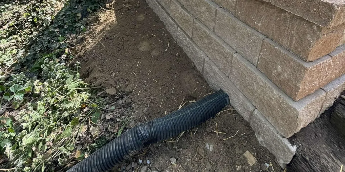 Retaining wall drainage install in Moline