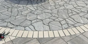 Flagstone patio paver install in Moline, Illinois