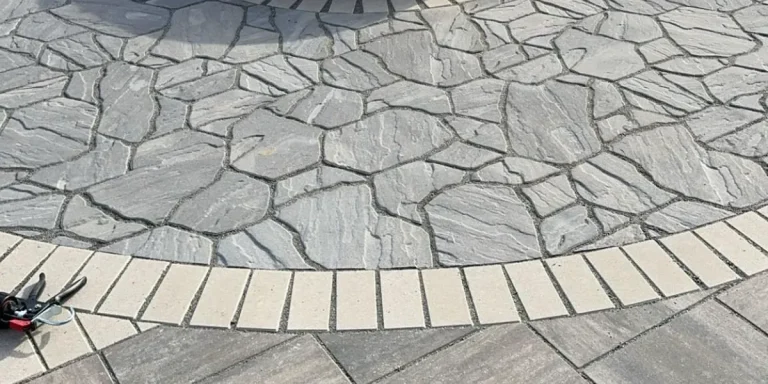 Flagstone patio paver install in Moline, Illinois