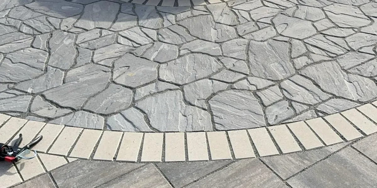 Flagstone patio paver install in Moline, Illinois